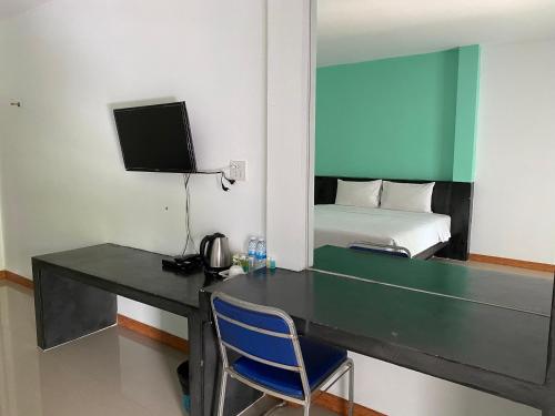 Imagen de la habitación del Tanatnan Hotel. Foto 16