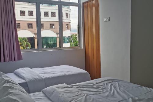 Imagen de la habitación del Tang Hotel. Foto 16
