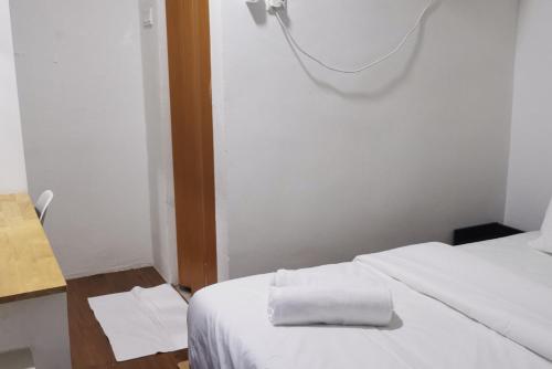 Imagen de la habitación del Tang Hotel. Foto 17