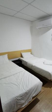 Imagen de la habitación del Tang Hotel. Foto 19