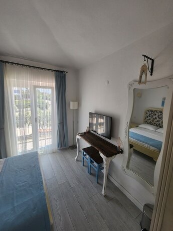 Imagen de la habitación del Tarcin Alacati Otel - Adults Only. Foto 11