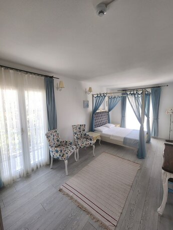 Imagen de la habitación del Tarcin Alacati Otel - Adults Only. Foto 15