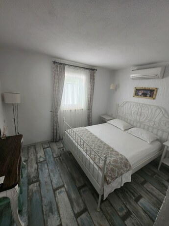 Imagen de la habitación del Tarcin Alacati Otel - Adults Only. Foto 16