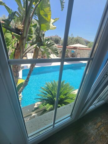Imagen de la habitación del Tarcin Alacati Otel - Adults Only. Foto 18