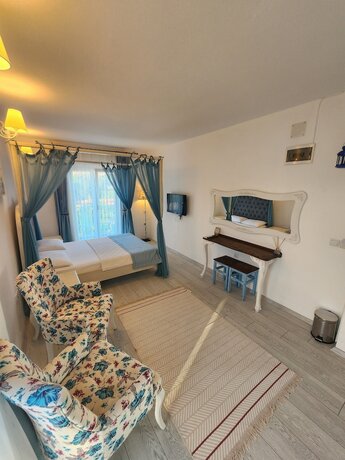 Imagen de la habitación del Tarcin Alacati Otel - Adults Only. Foto 19