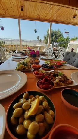 Imagen del bar/restaurante del Tas Konak Butik Otel Bungalov. Foto 5