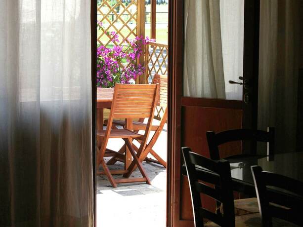 Imagen de la habitación del Tasteful Apartment In Roselle Terme With Fenced Garden. Foto 7