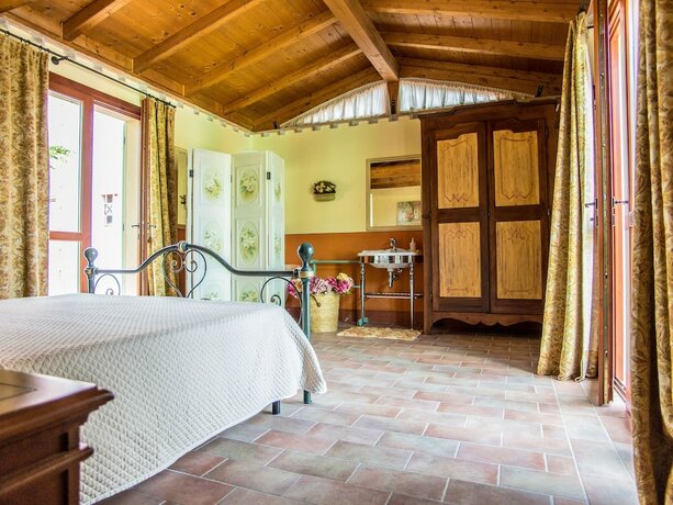 Imagen de la habitación del Tasteful Apartment In Roselle Terme With Fenced Garden. Foto 11