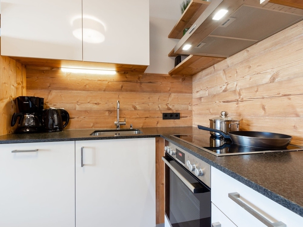 Imagen de la habitación del Tauernsuites Mitterwirt By Alps Residence. Foto 8