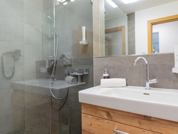 Imagen de la habitación del Tauernsuites Mitterwirt By Alps Residence. Foto 14