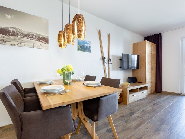 Imagen del bar/restaurante del Tauernsuites Mitterwirt By Alps Residence. Foto 2