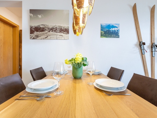 Imagen del bar/restaurante del Tauernsuites Mitterwirt By Alps Residence. Foto 3