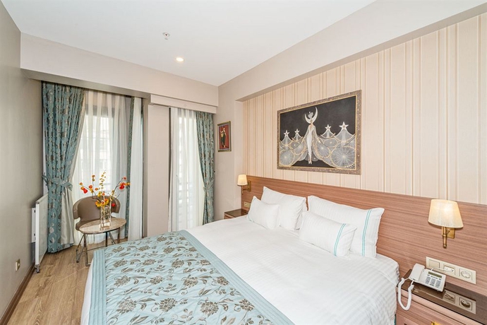 Imagen de la habitación del Taximist Hotel. Foto 14