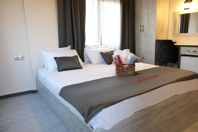 Imagen de la habitación del Tek Han Kumkuyu Hotel. Foto 16