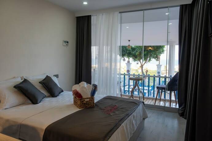 Imagen de la habitación del Tek Han Kumkuyu Hotel. Foto 18