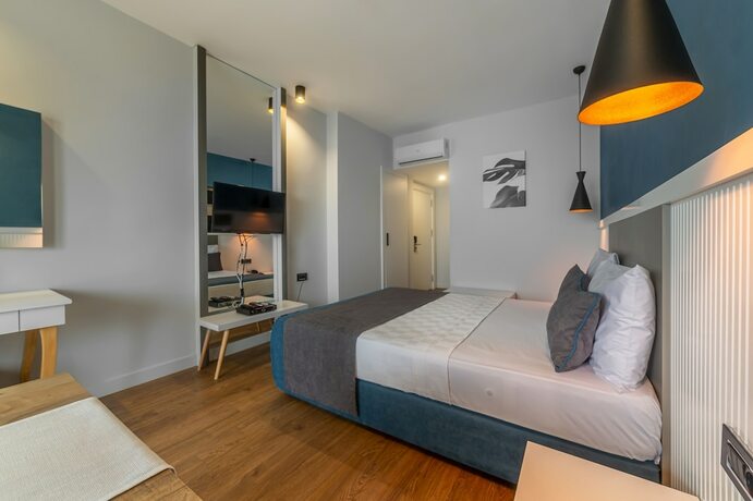 Imagen de la habitación del Tema 242 Hotel. Foto 15