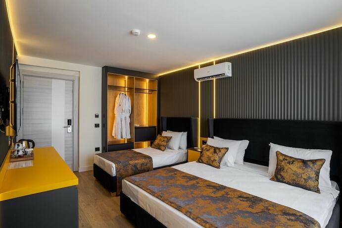 Imagen de la habitación del Tema 242 Hotel. Foto 17