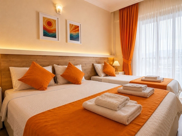 Imagen de la habitación del Tenedos İskele Otel. Foto 4