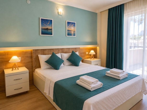 Imagen de la habitación del Tenedos İskele Otel. Foto 5
