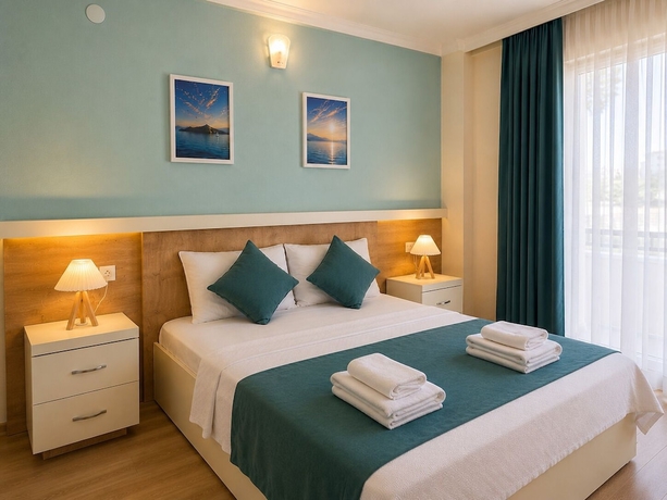 Imagen de la habitación del Tenedos İskele Otel. Foto 6