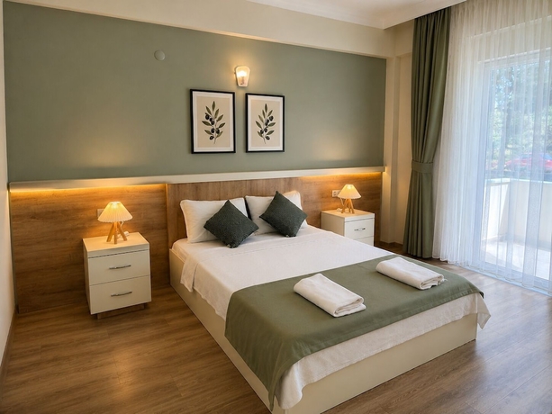 Imagen de la habitación del Tenedos İskele Otel. Foto 8