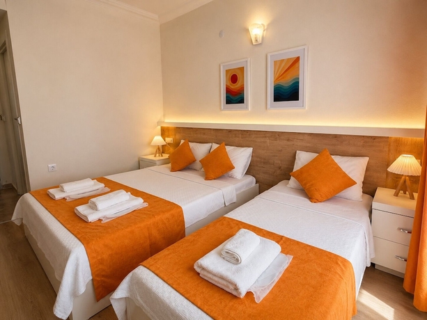 Imagen de la habitación del Tenedos İskele Otel. Foto 10