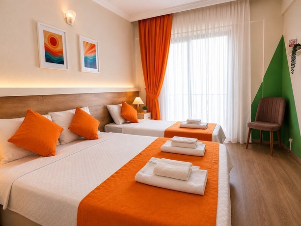 Imagen de la habitación del Tenedos İskele Otel. Foto 11