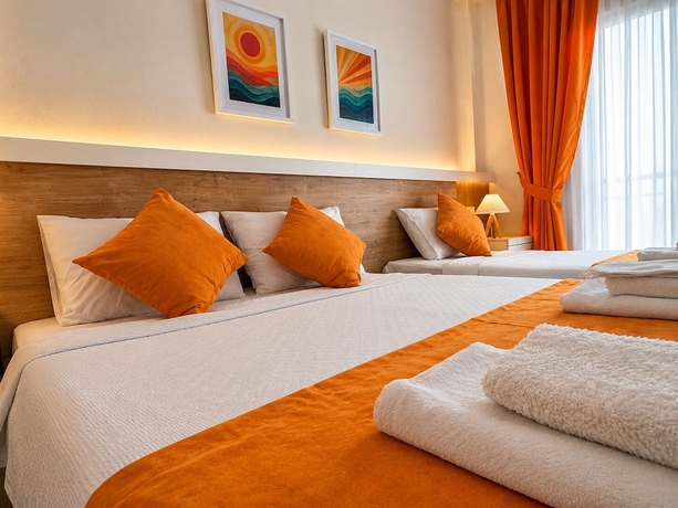 Imagen de la habitación del Tenedos İskele Otel. Foto 13