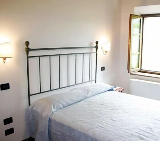 Imagen de la habitación del Tenuta Il Tresto. Foto 18