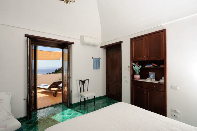 Imagen de la habitación del Tenuta Mamma Carmela. Foto 7