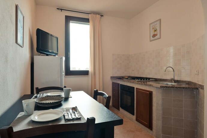 Imagen de la habitación del Tenute Delogu. Foto 22