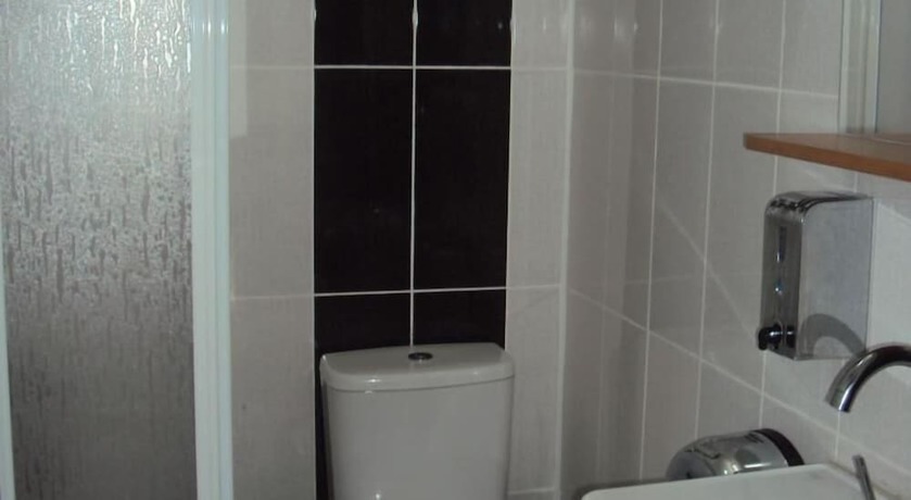 Imagen de la habitación del Teos Hotel. Foto 11