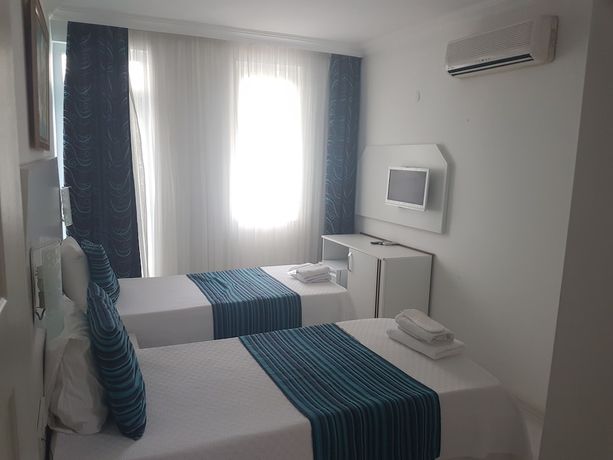 Imagen de la habitación del Teos Hotel. Foto 12