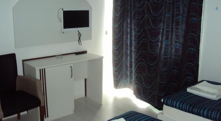 Imagen de la habitación del Teos Hotel. Foto 13