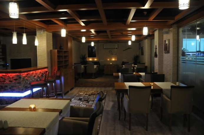 Imagen del bar/restaurante del Teos Hotel. Foto 8