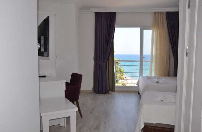 Imagen de la habitación del Tepe Beach Hotel. Foto 8