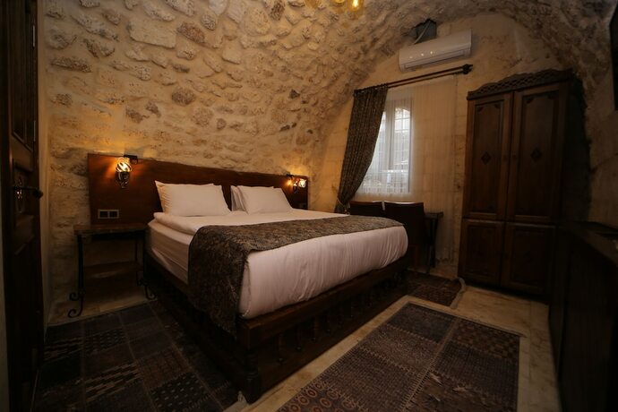 Imagen de la habitación del Tessera Hotel. Foto 16