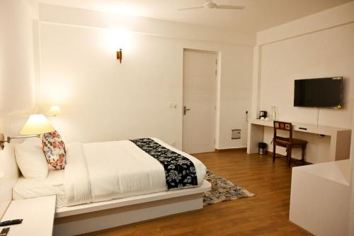 Imagen de la habitación del Tethys Himalaya Resort & Spa, Kasauli. Foto 19