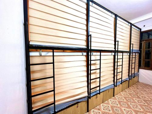 Imagen de la habitación del Th&agrave;nh Đạt Hostel ( Hostel and Motobike Rental ). Foto 16