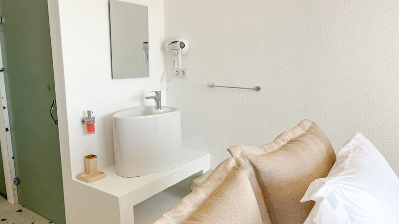 Imagen de la habitación del Thanos Hotel. Foto 15