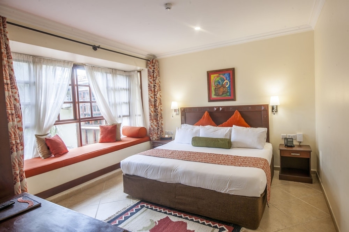 Imagen de la habitación del The African Tulip Hotel. Foto 8
