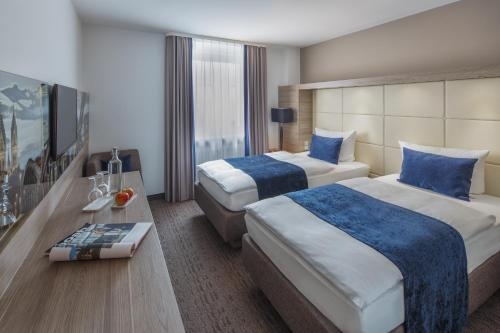 Imagen de la habitación del The Alex Hotel. Foto 7