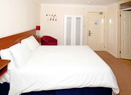 Imagen de la habitación del The Angel Hotel. Foto 10