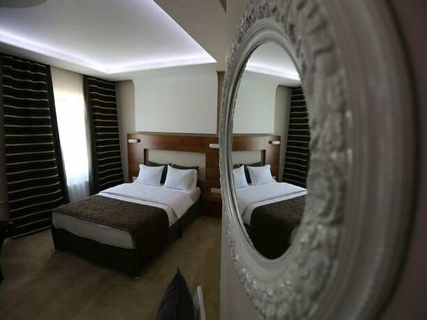 Imagen de la habitación del The Apple Palace. Foto 15