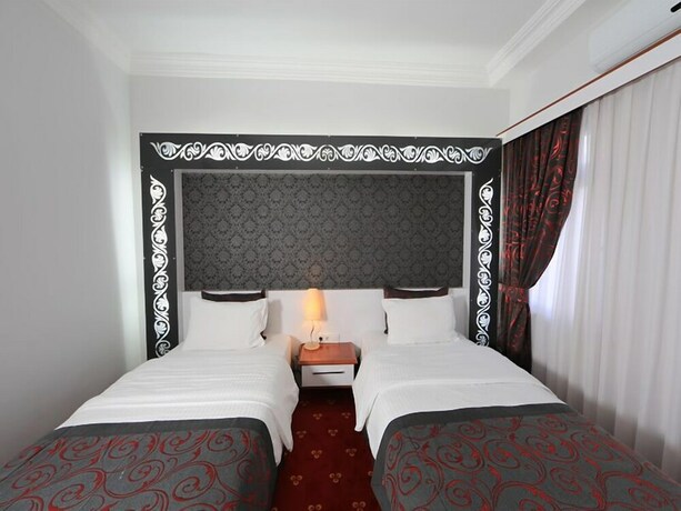 Imagen de la habitación del The Apple Palace. Foto 18