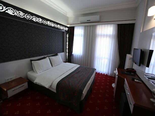 Imagen de la habitación del The Apple Palace. Foto 25