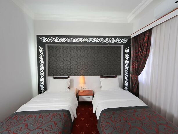 Imagen de la habitación del The Apple Palace. Foto 29