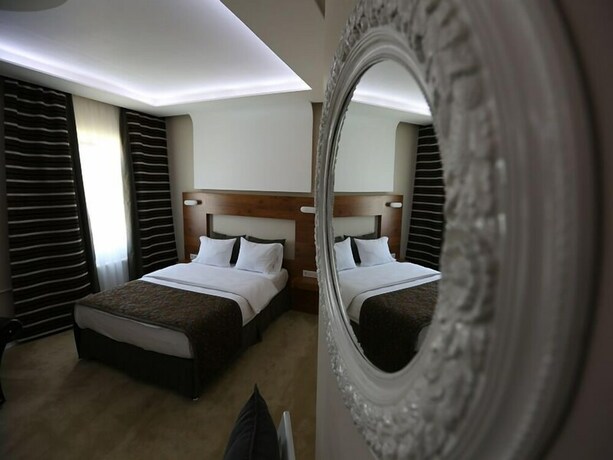 Imagen de la habitación del The Apple Palace. Foto 33