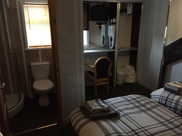 Imagen de la habitación del The Brighton. Foto 6