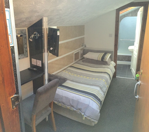 Imagen de la habitación del The Brighton. Foto 7